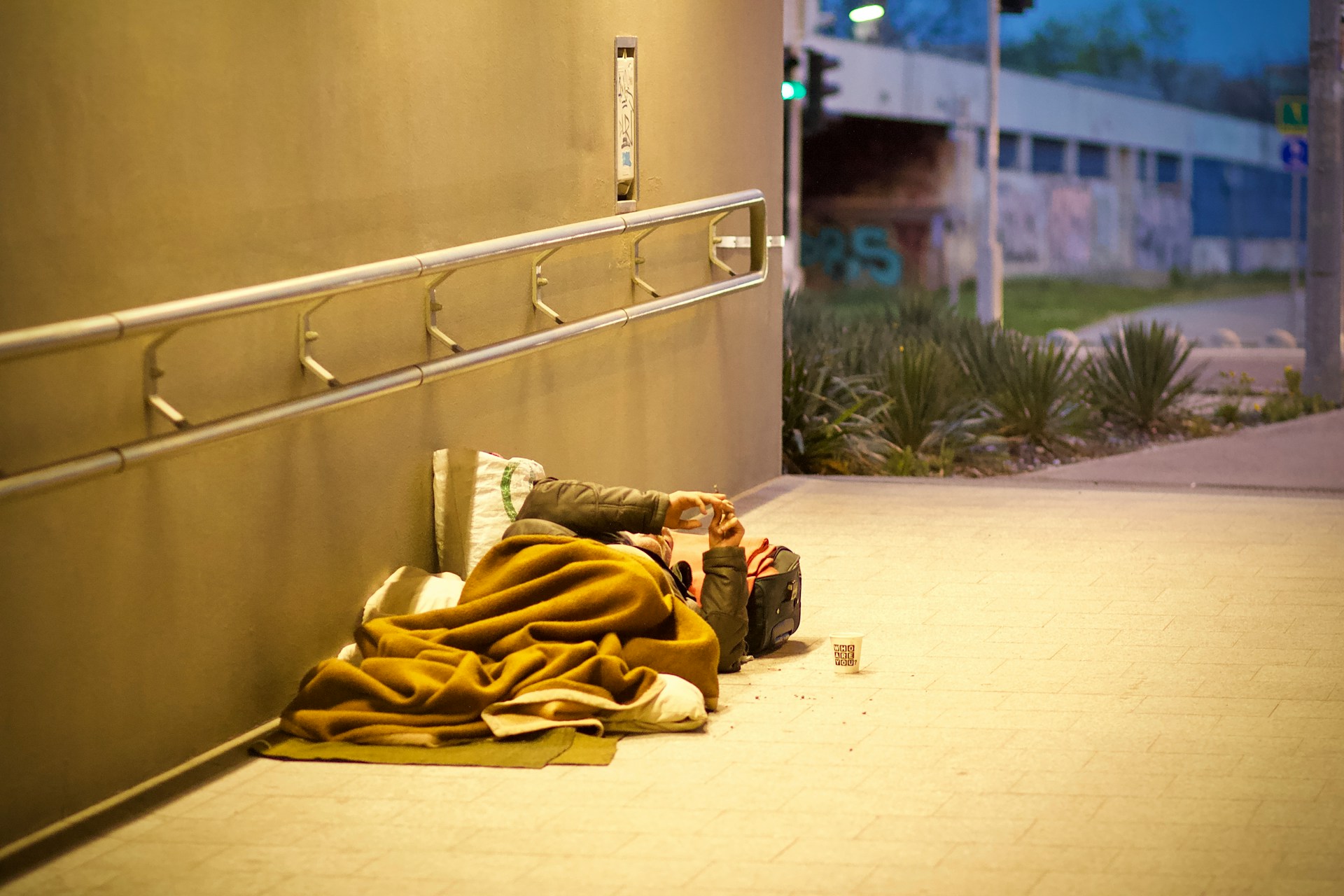 person lying on the street